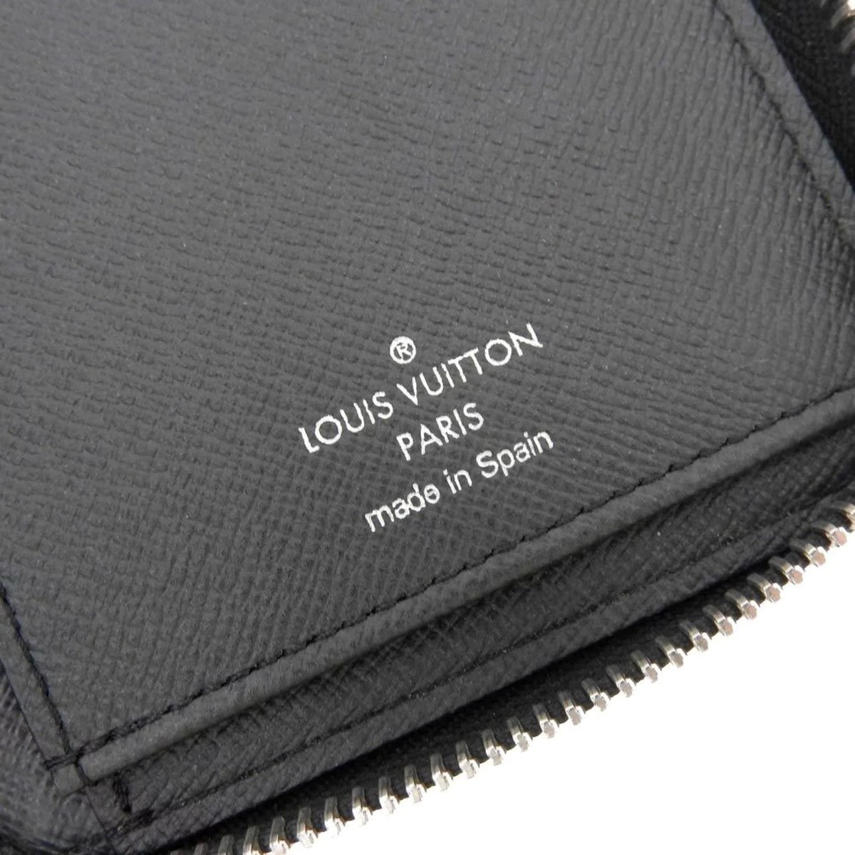 Pre-Owned Louis Vuitton LOUIS VUITTON Taiga Zippy Wallet Vertical Round Zipper Long Noir M30503 (Good)